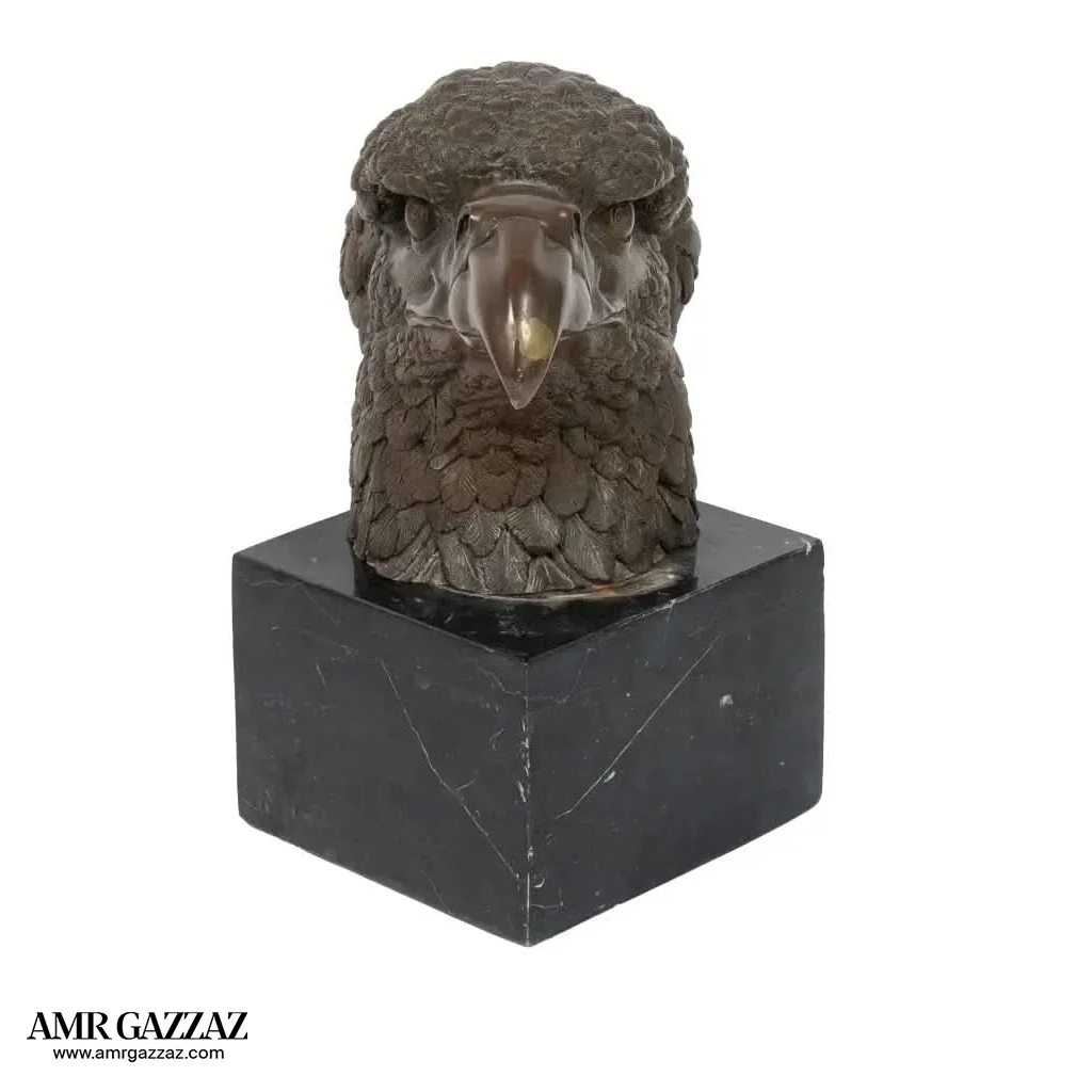 A Bronze Sculpture an Eagle Head on Marble Pedestal