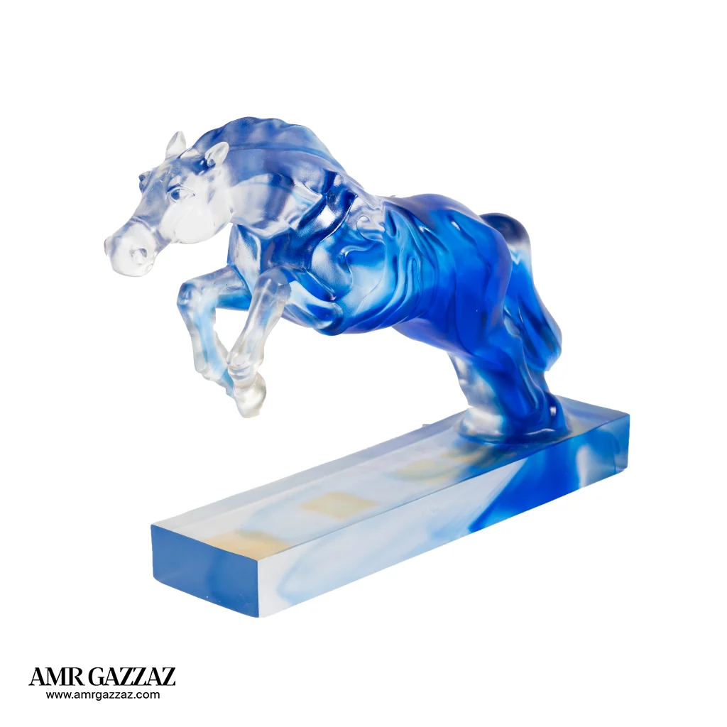 A PATE-DE-VERRE JUMPING HORSE