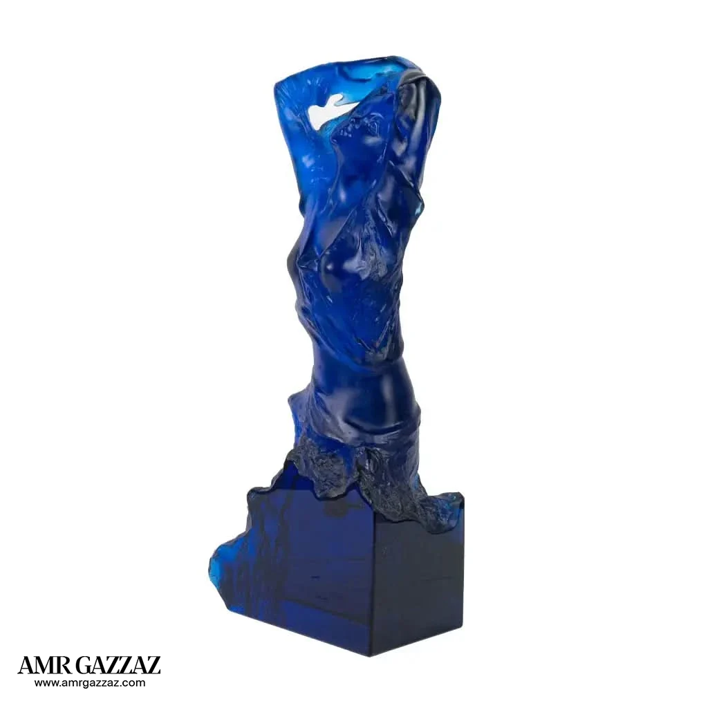 A PATE-DE-VERRE FEMALE GLASS SCULPTURE blue