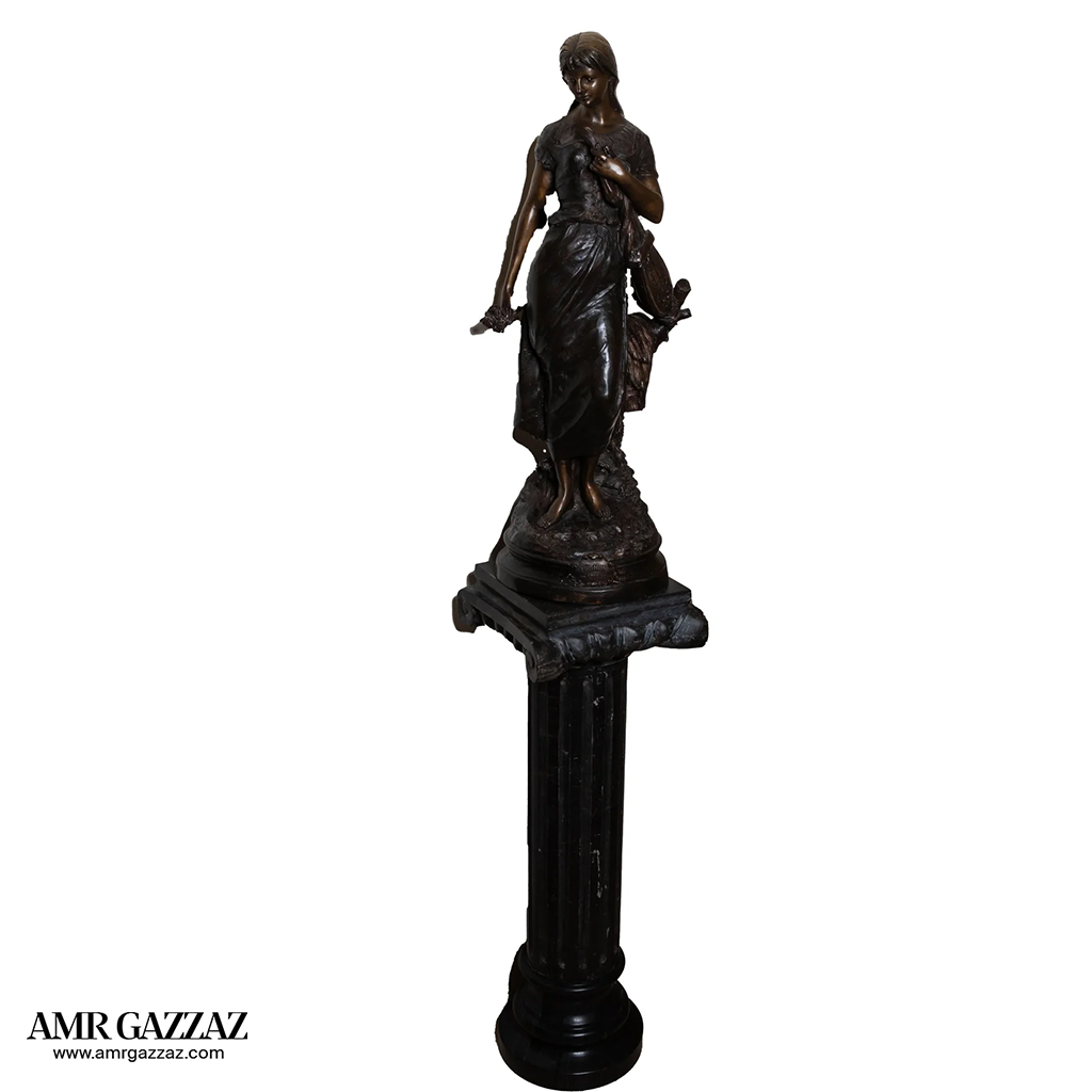 A girl from the Roman era Beautiful classic Italian bronze statue of a young girl from the Roman era on a marble column