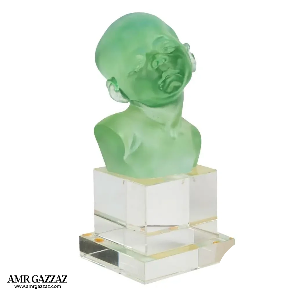 A PATE-DE-VERRE BABY HEAD &nbsp;GLASS SCULPTURE