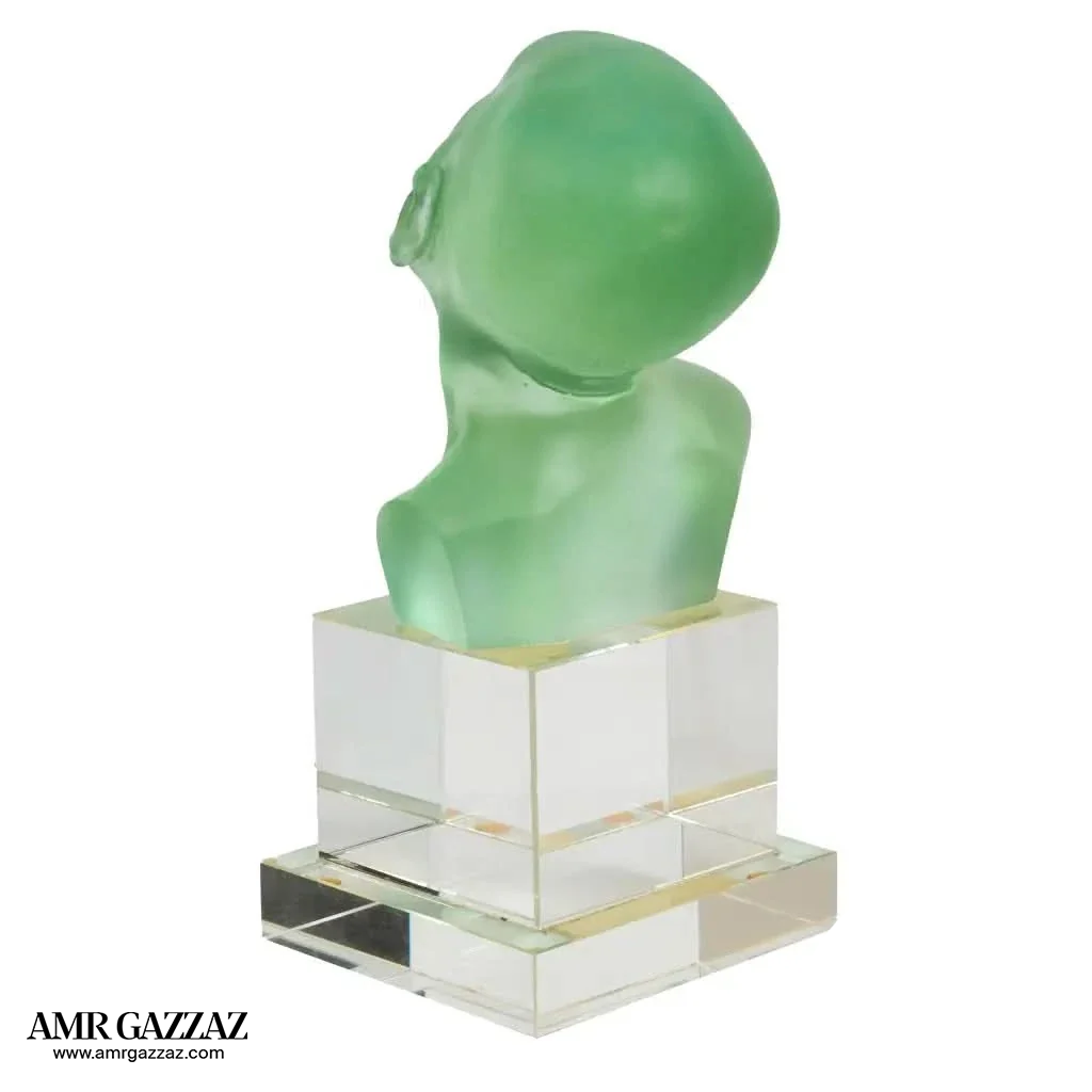 A PATE-DE-VERRE BABY HEAD &nbsp;GLASS SCULPTURE