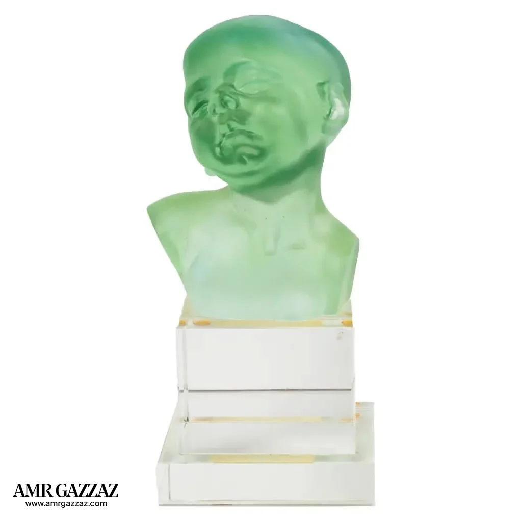 A PATE-DE-VERRE BABY HEAD &nbsp;GLASS SCULPTURE