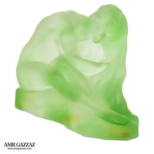 A PATE-DE-VERRE FEMALE GLASS green