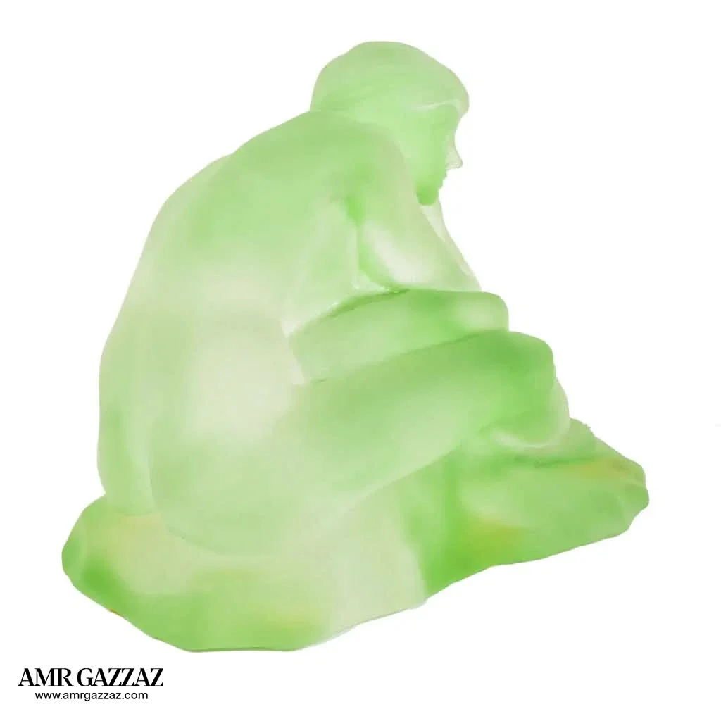 A PATE-DE-VERRE FEMALE GLASS green