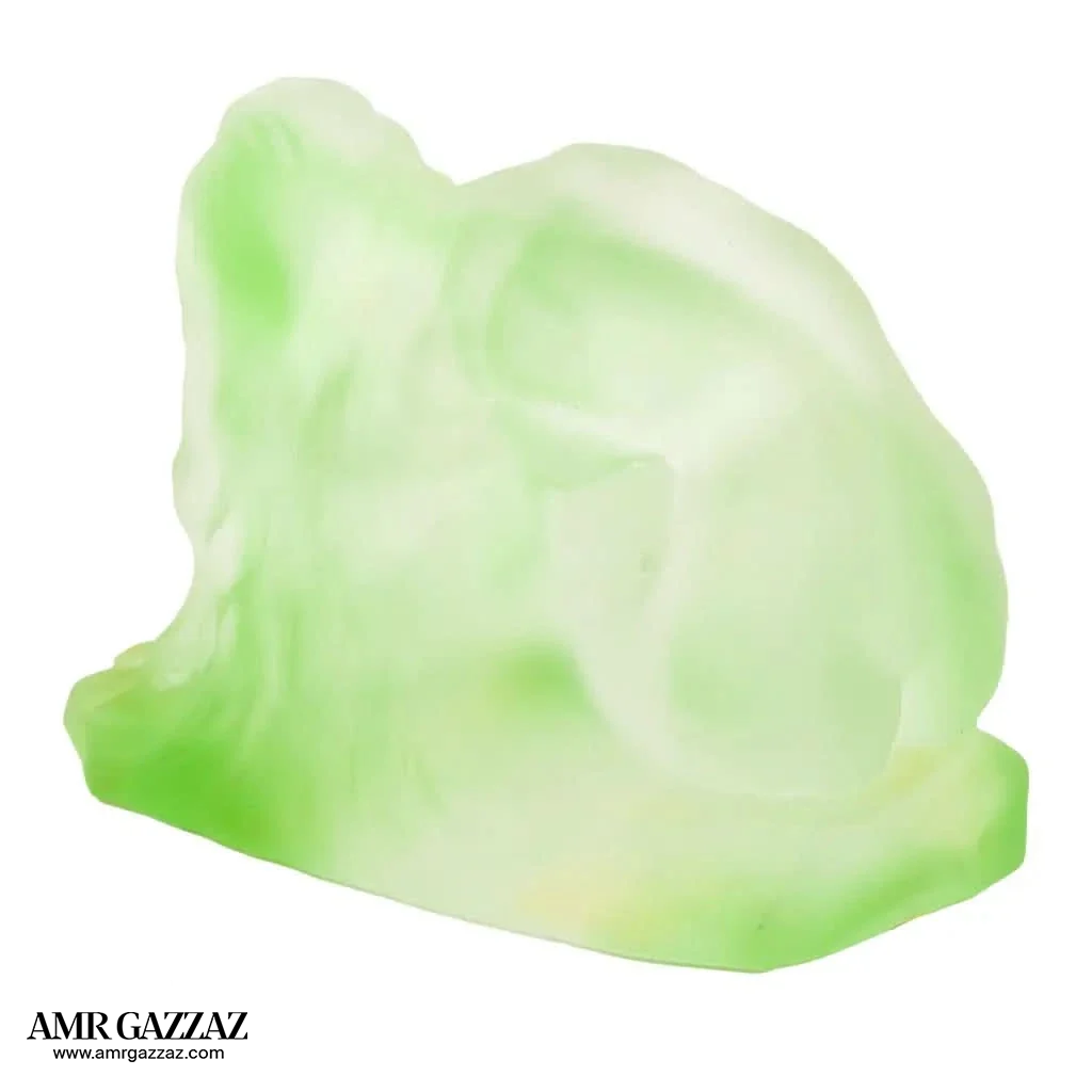 A PATE-DE-VERRE FEMALE GLASS green