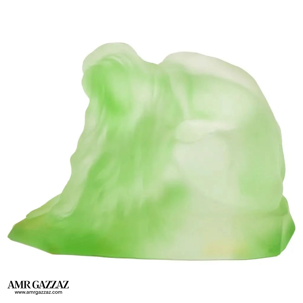 A PATE-DE-VERRE FEMALE GLASS green