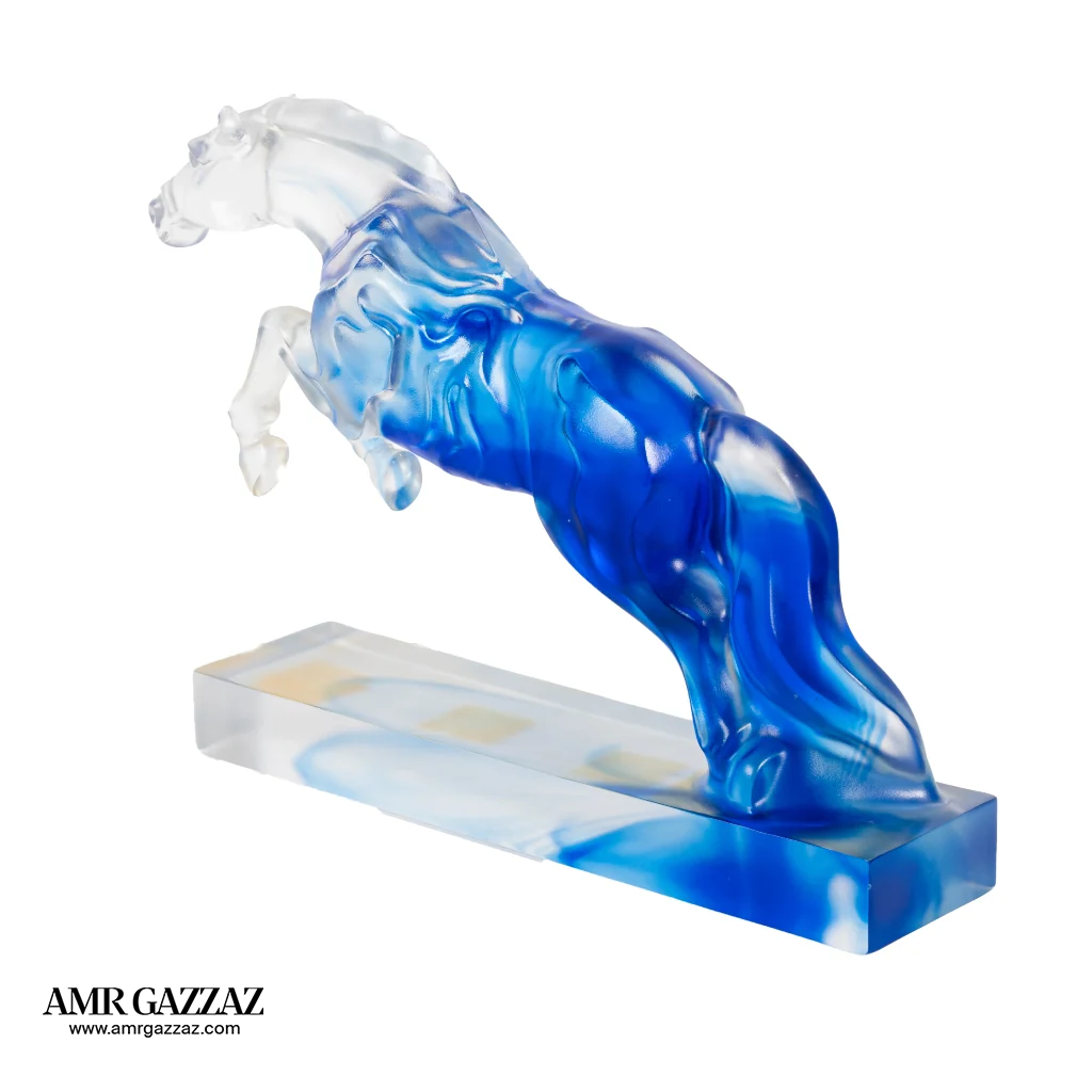A PATE-DE-VERRE JUMPING HORSE