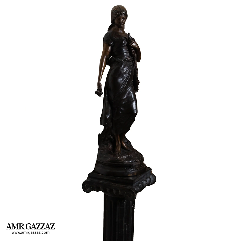 A girl from the Roman era Beautiful classic Italian bronze statue of a young girl from the Roman era on a marble column
