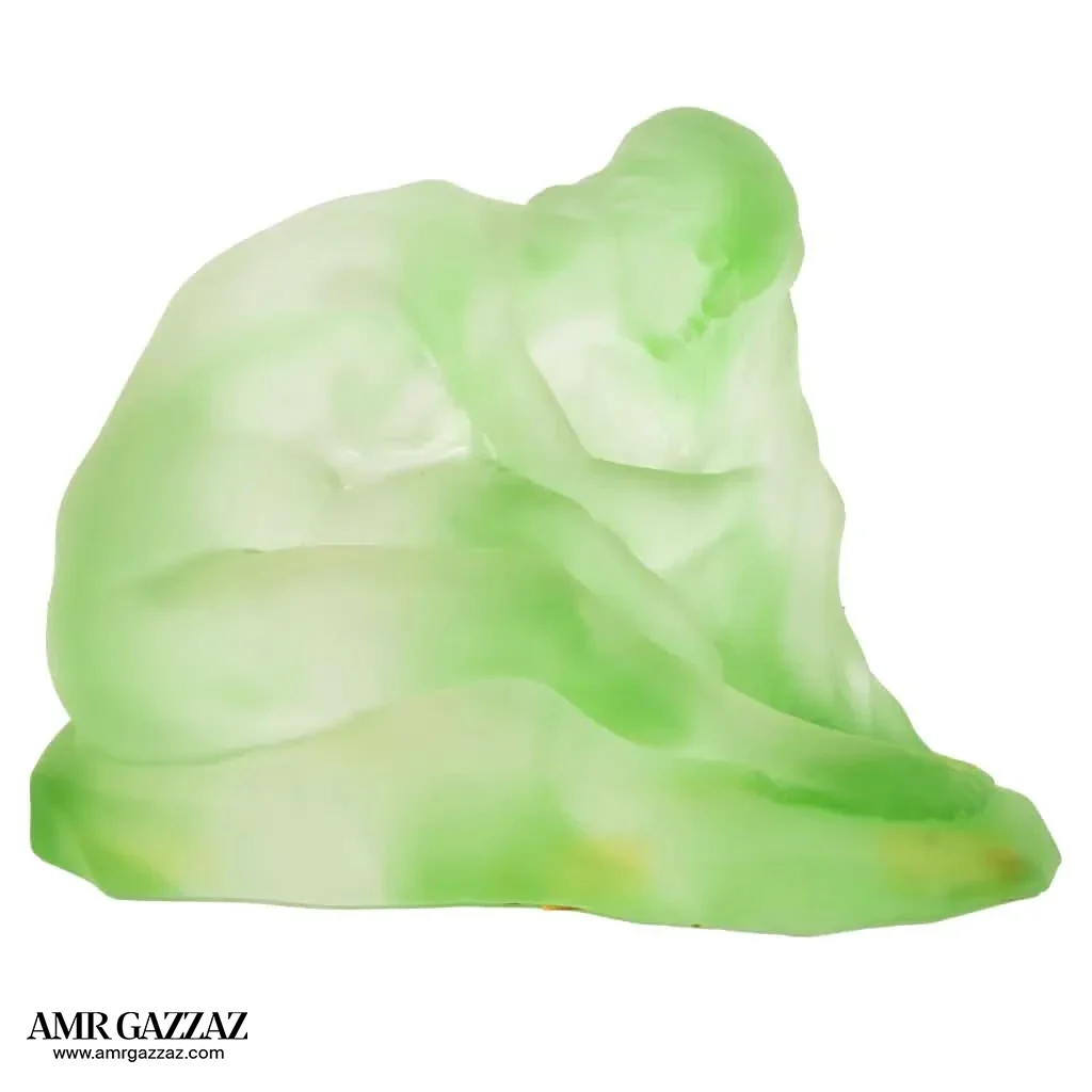 A PATE-DE-VERRE FEMALE GLASS green