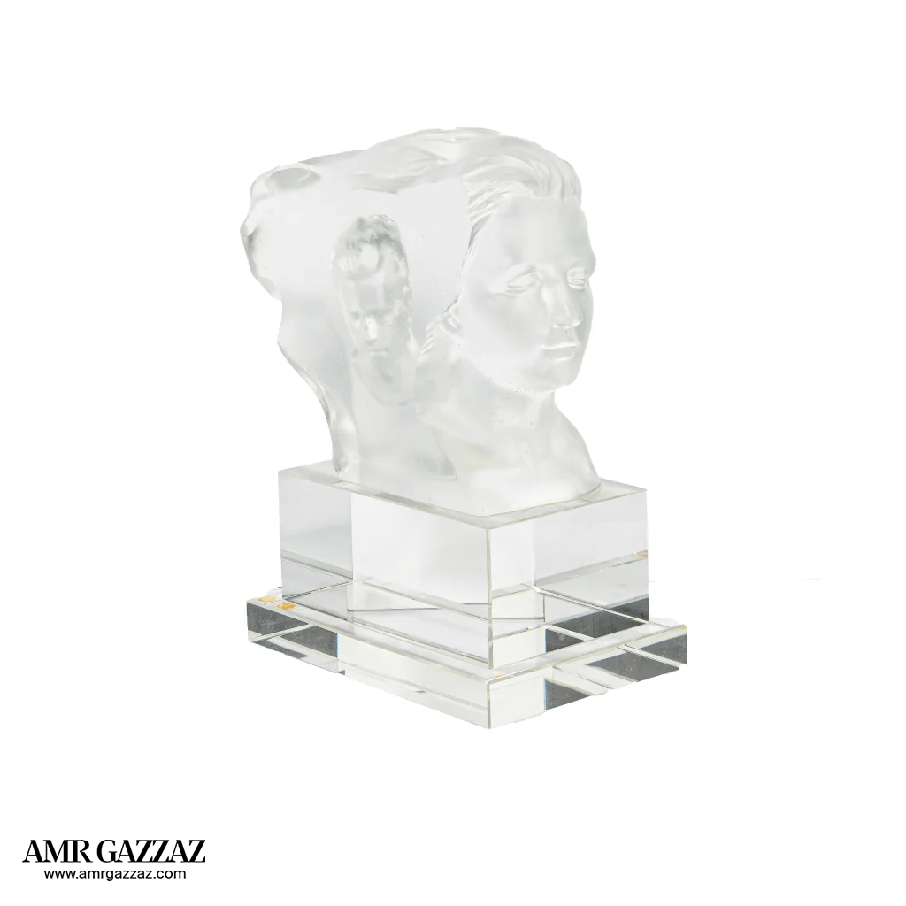 A PATE-DE-VERRE DOUBLE FACE GLASS SCULPTURE