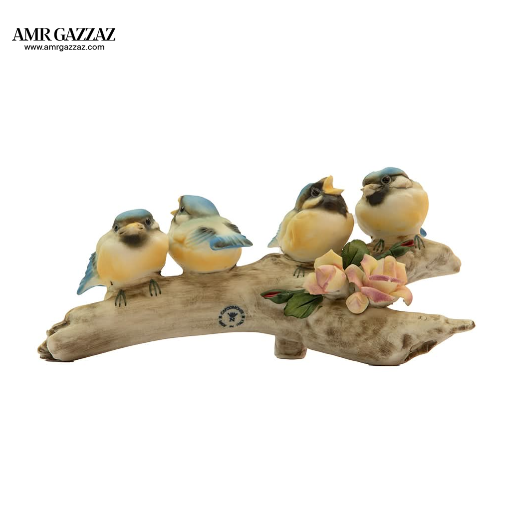 Vintage napoli capidomente group of blue birds on branch