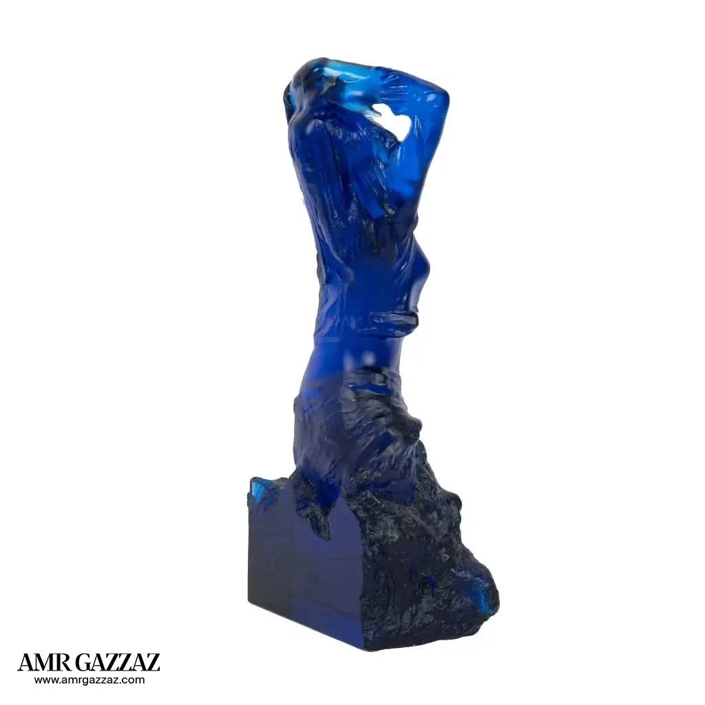 A PATE-DE-VERRE FEMALE GLASS SCULPTURE blue