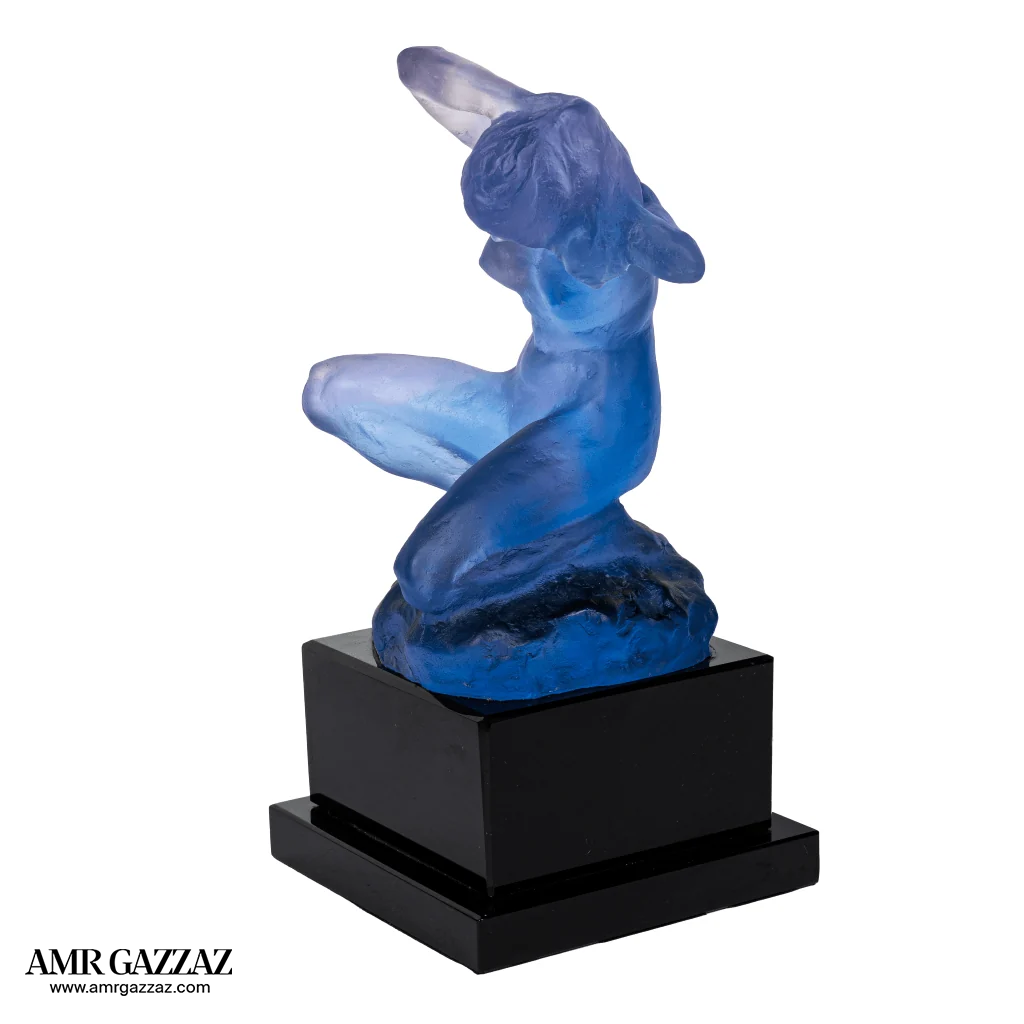 A PATE-DE-VERRE LADY GLASS SCULPTURE