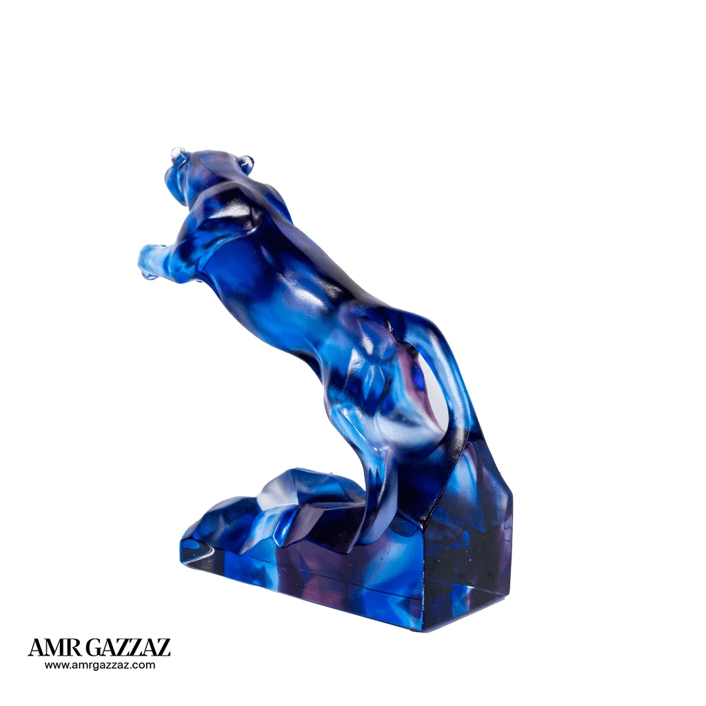 A PATE-DE-VERRE  JUMPING JAGUAR
