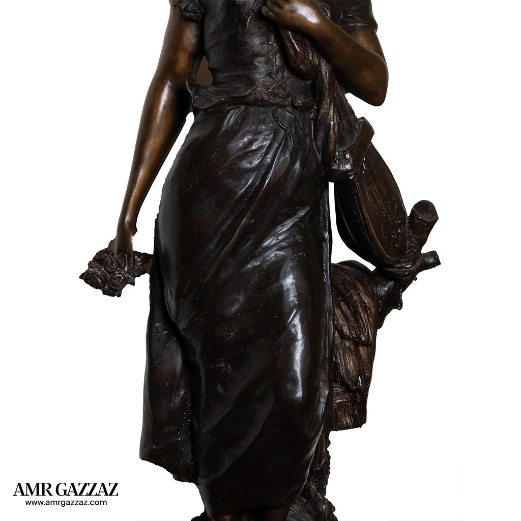 A girl from the Roman era Beautiful classic Italian bronze statue of a young girl from the Roman era on a marble column
