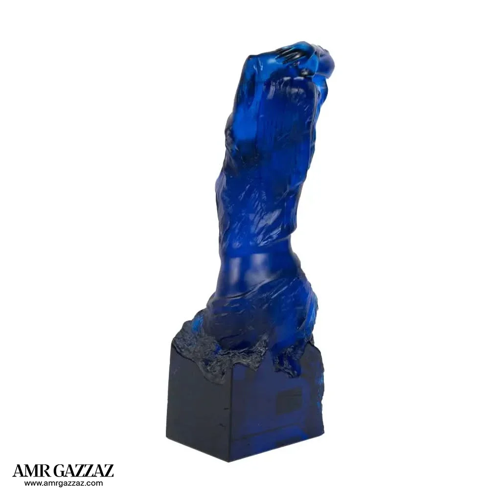 A PATE-DE-VERRE FEMALE GLASS SCULPTURE blue