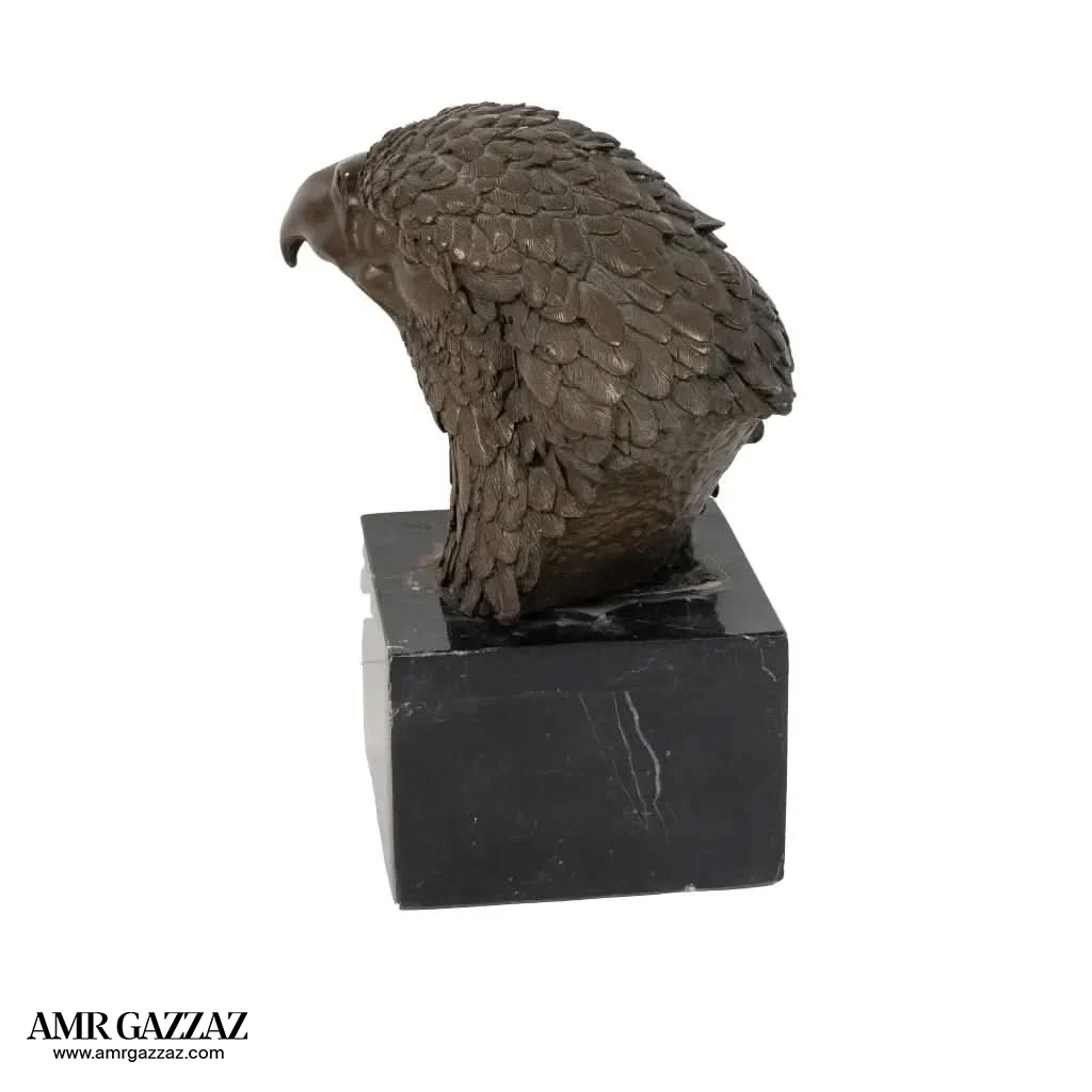 A Bronze Sculpture an Eagle Head on Marble Pedestal