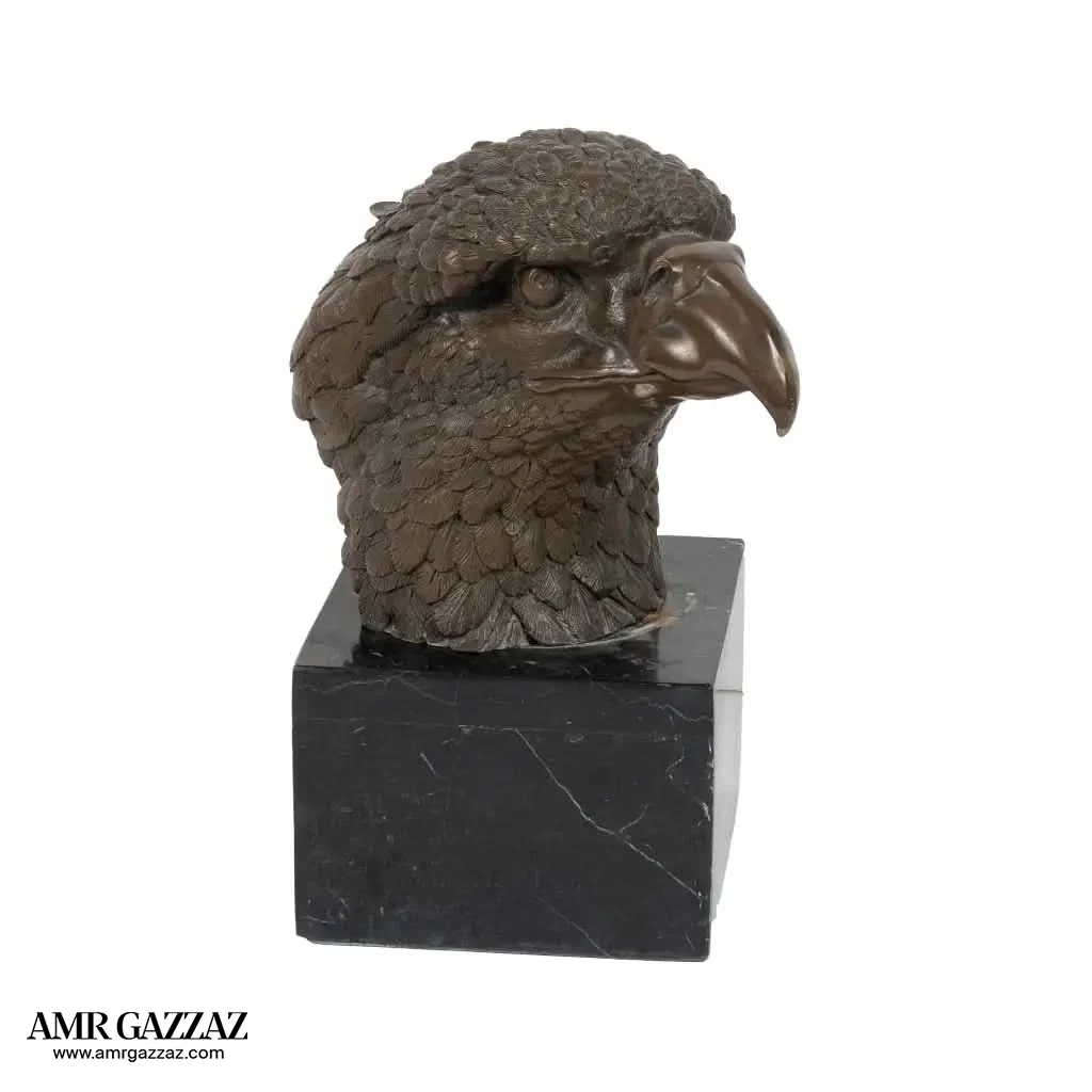 A Bronze Sculpture an Eagle Head on Marble Pedestal