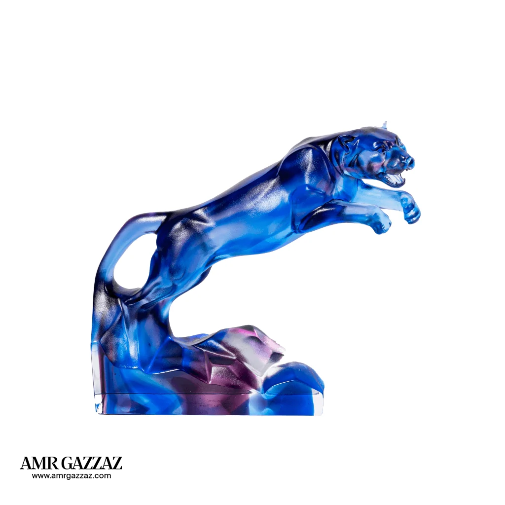 A PATE-DE-VERRE  JUMPING JAGUAR