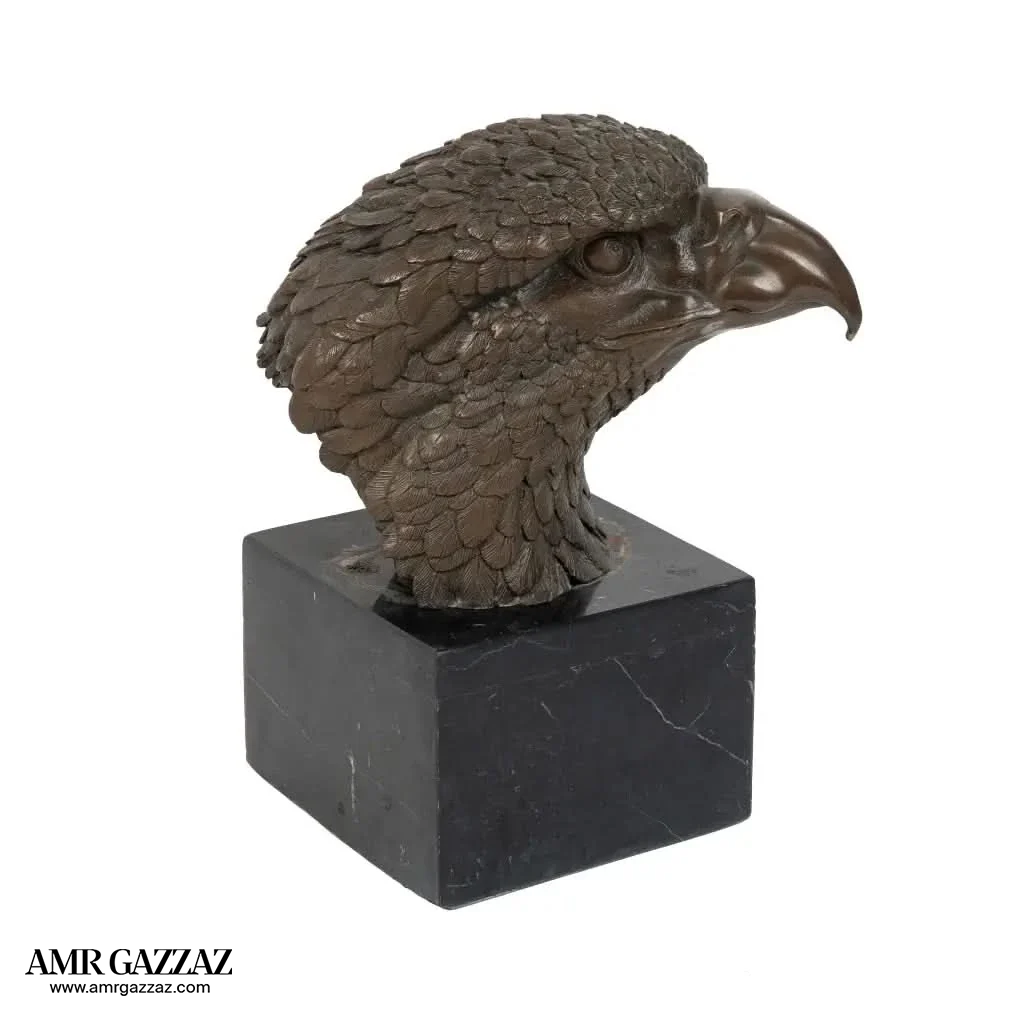 A Bronze Sculpture an Eagle Head on Marble Pedestal