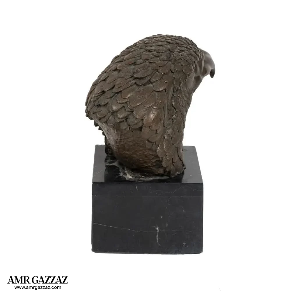 A Bronze Sculpture an Eagle Head on Marble Pedestal