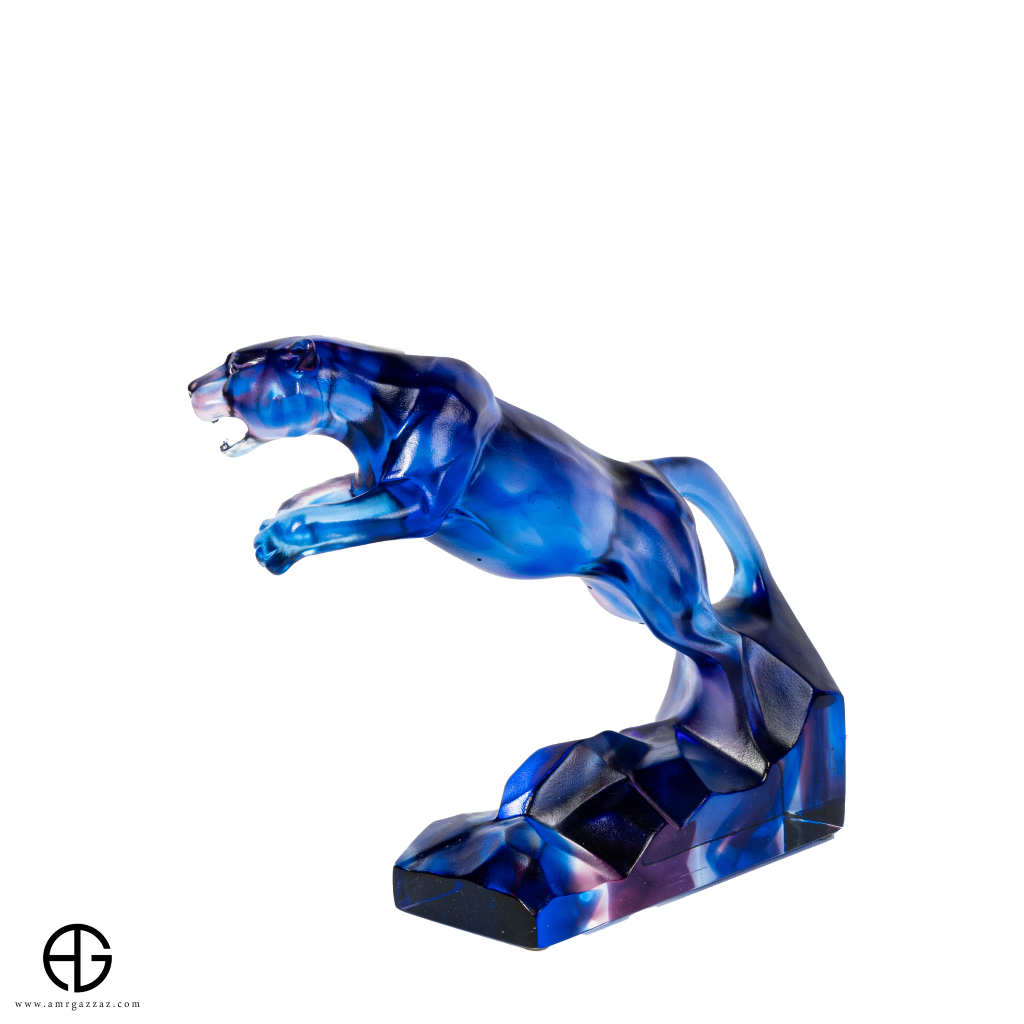 A PATE-DE-VERRE  JUMPING JAGUAR