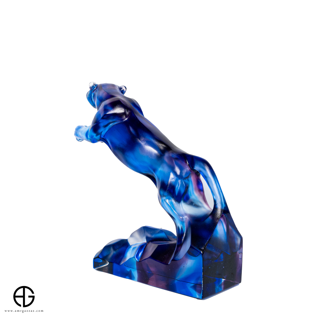 A PATE-DE-VERRE  JUMPING JAGUAR