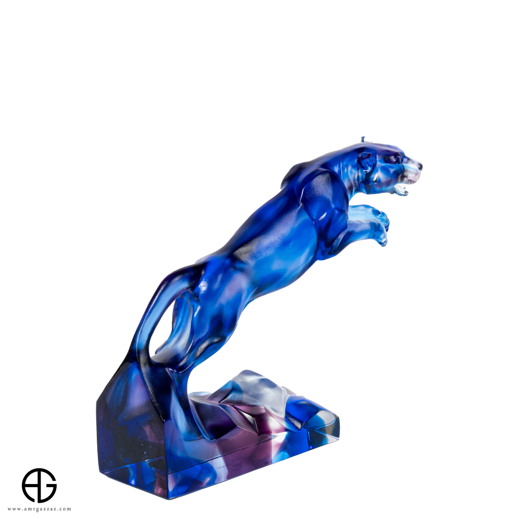 A PATE-DE-VERRE  JUMPING JAGUAR