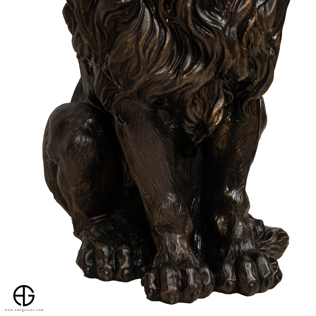 Lion Sitting on The Pedestal Sculpture