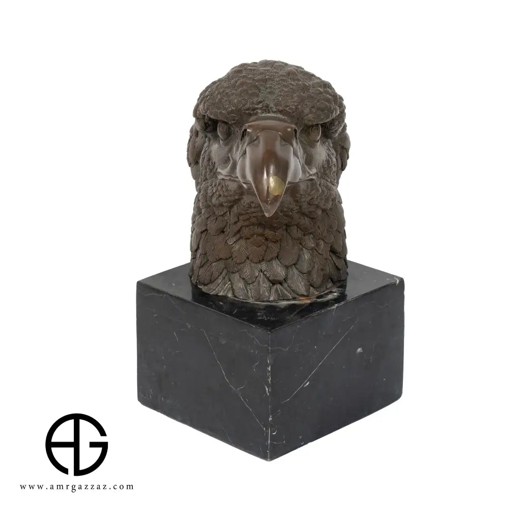 A Bronze Sculpture an Eagle Head on Marble Pedestal