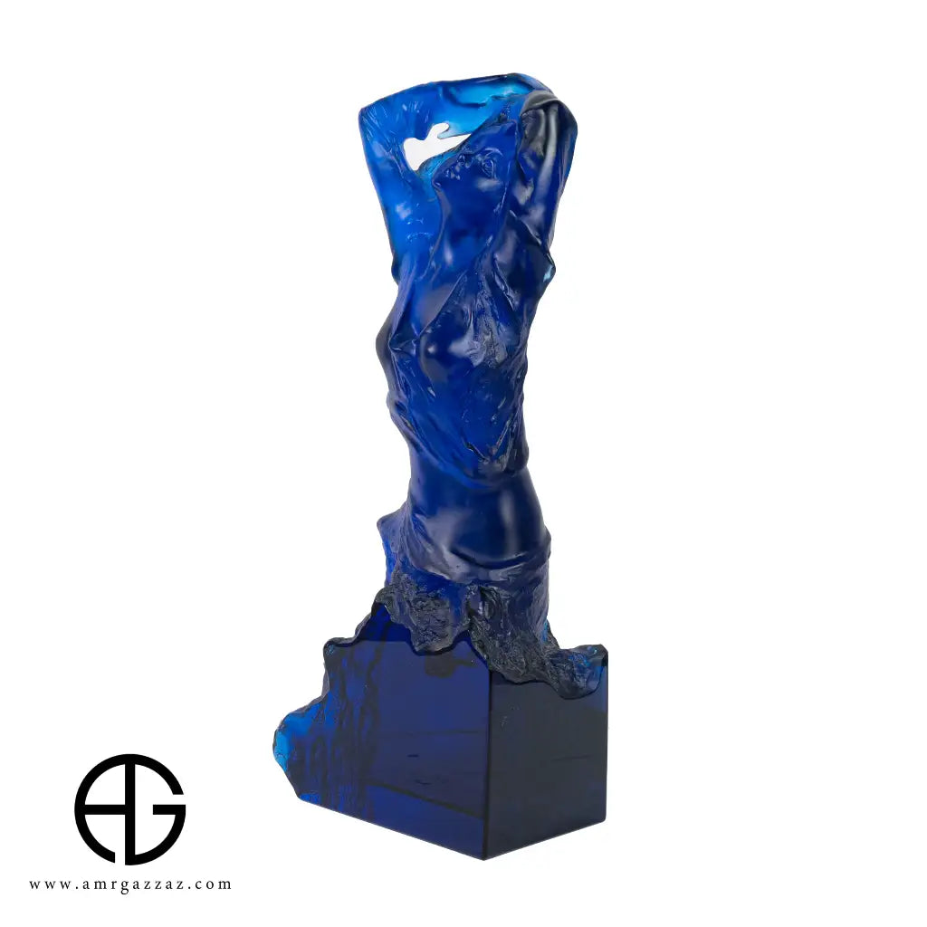 A PATE-DE-VERRE FEMALE GLASS SCULPTURE blue