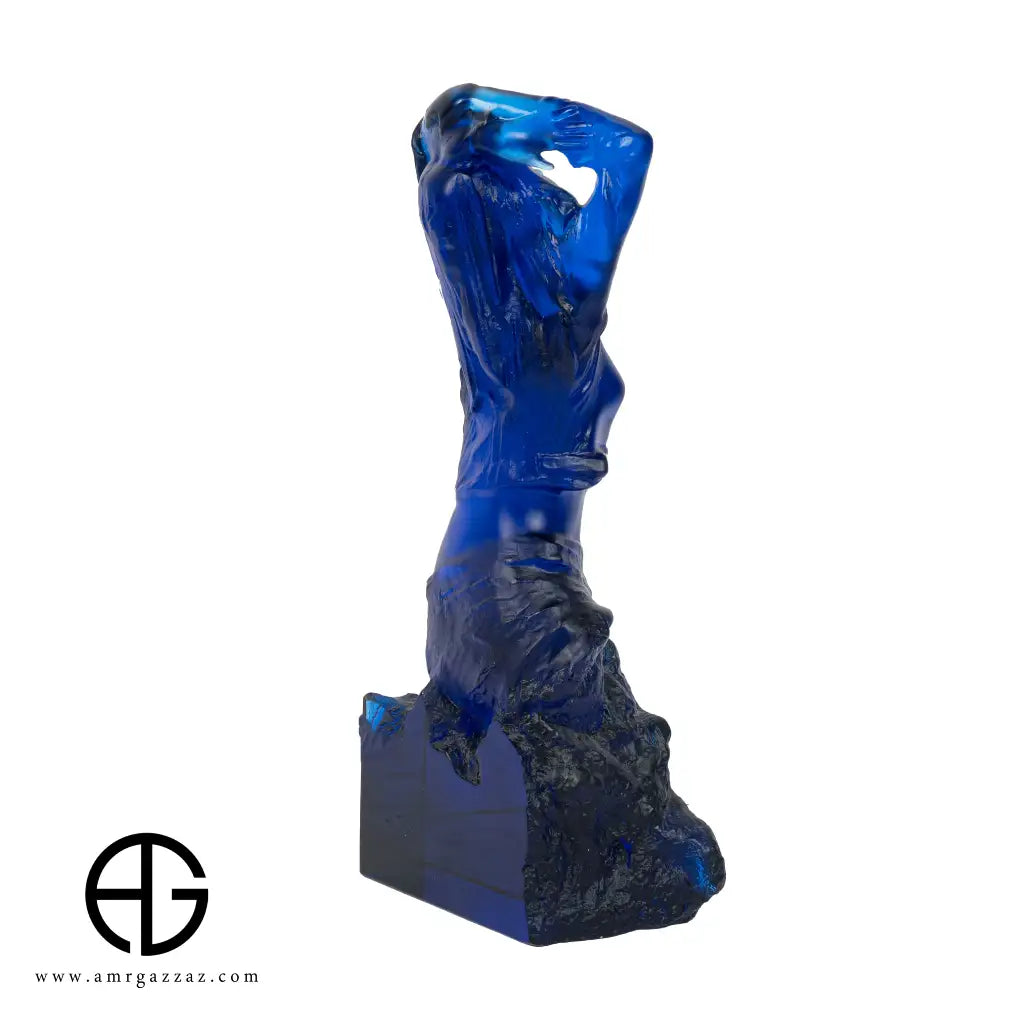 A PATE-DE-VERRE FEMALE GLASS SCULPTURE blue