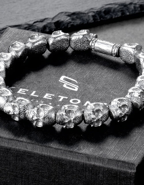 Load image into Gallery viewer, Skulls for Her | Empire - Silver All Skulls Bracelet
