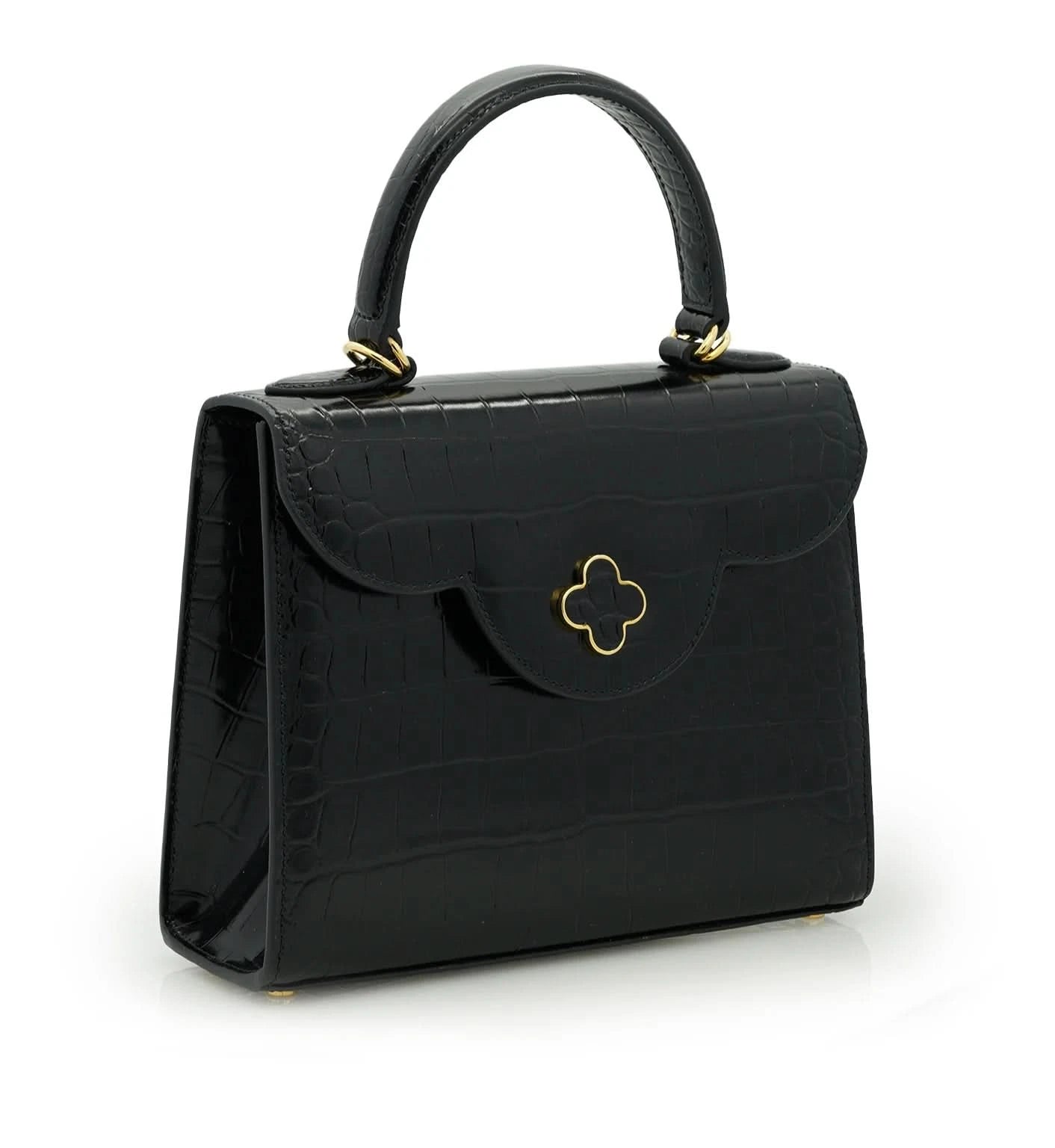 حقيبة السيدة الأولى من الجلد الأسود المنقوش بنقشة جلد التمساح