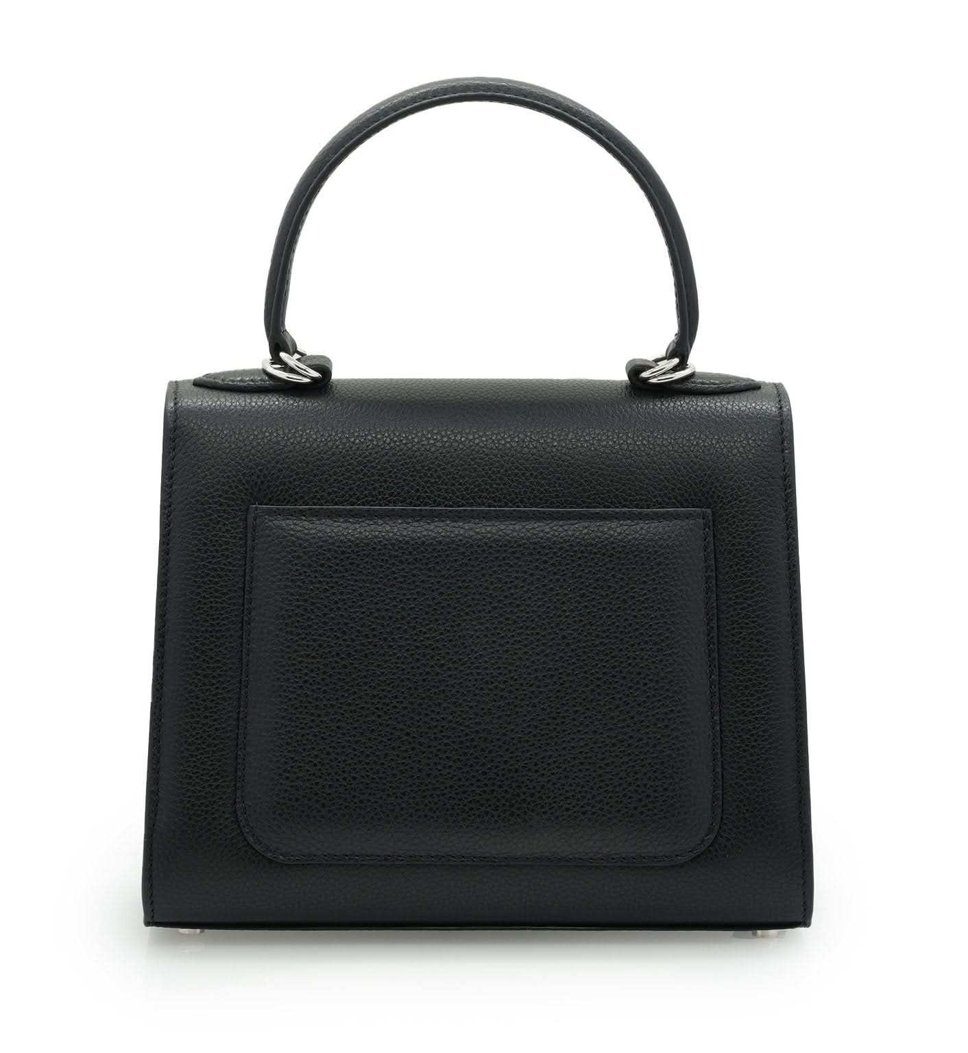 حقيبة يد جلدية سوداء مزخرفة على شكل زهرة للسيدة الأولى