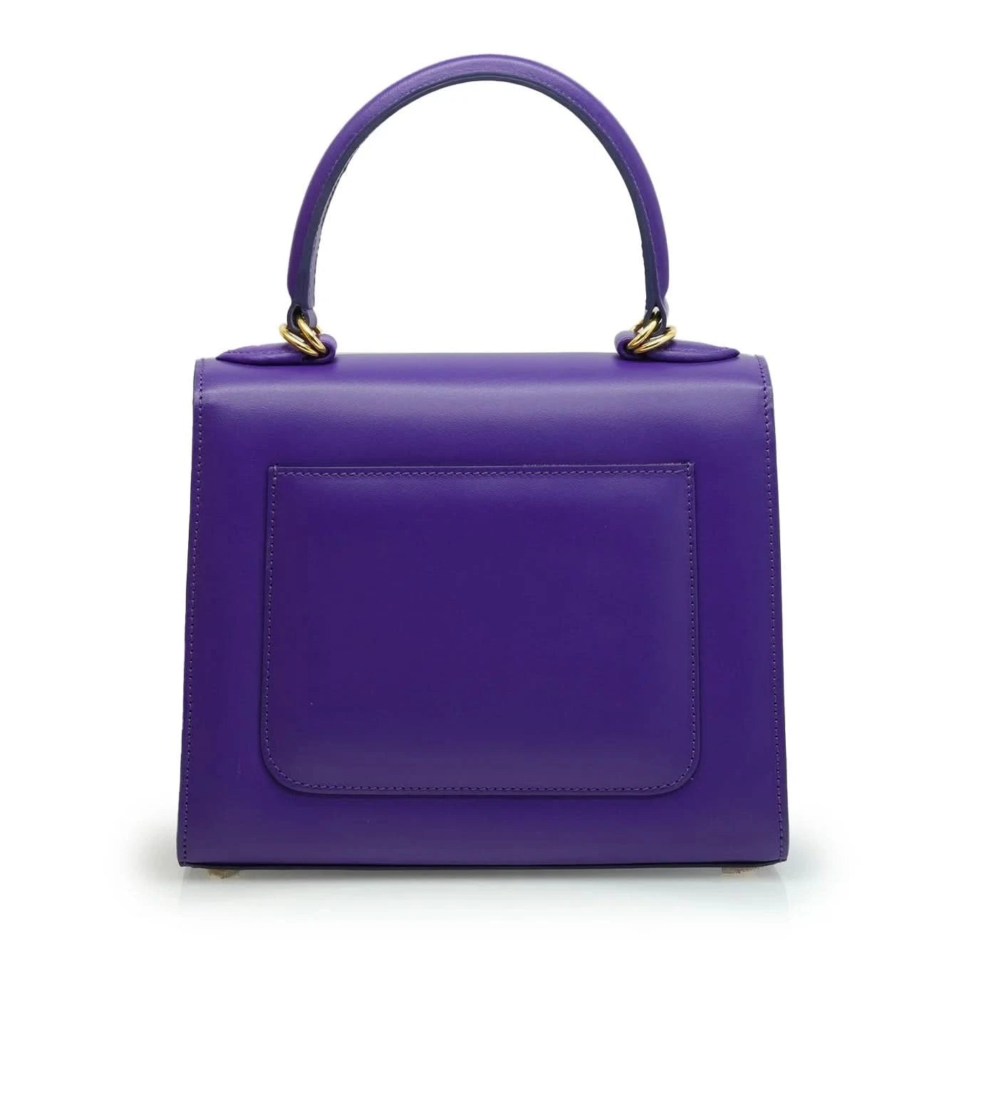 حقيبة يد جلدية أرجوانية اللون من تصميم السيدة الأولى