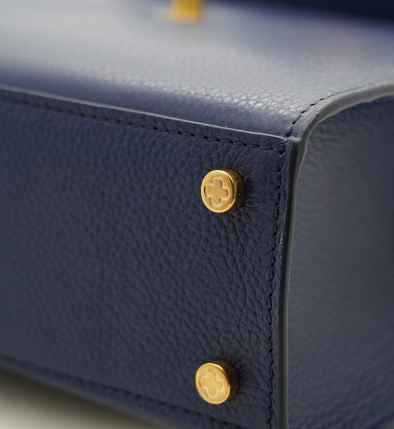 First Lady Flower-twist antique gold Navy blue textured leather handbag
