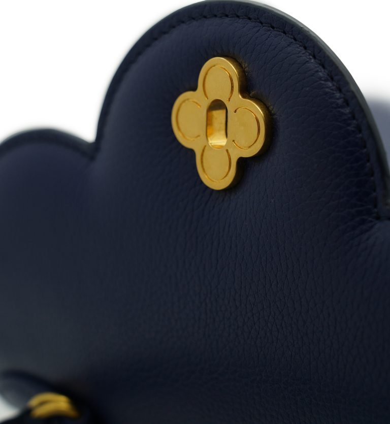 First Lady Flower-twist antique gold Navy blue textured leather handbag