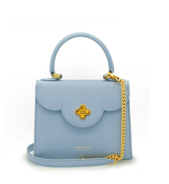 حقيبة يد جلدية صغيرة مرصعة بالألماس باللون الأزرق السماوي للسيدة الأولى