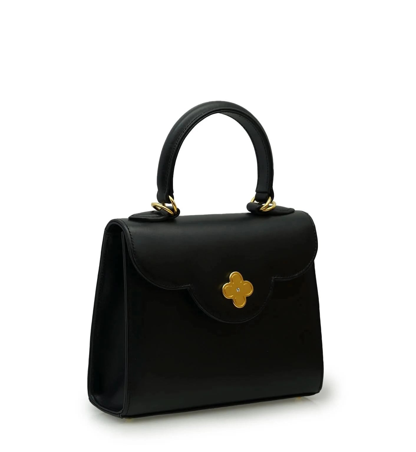 حقيبة يد صغيرة من الجلد الأسود الماسي للسيدة الأولى