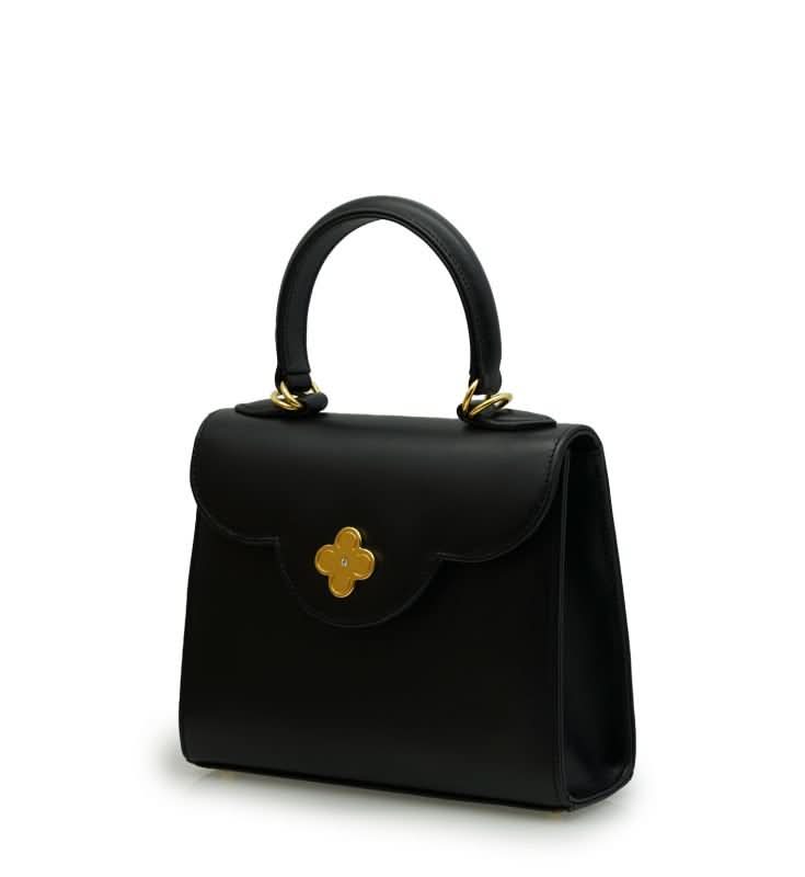 حقيبة يد صغيرة من الجلد الأسود الماسي للسيدة الأولى