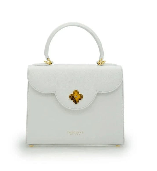 حقيبة يد جلدية بيضاء من تصميم السيدة الأولى