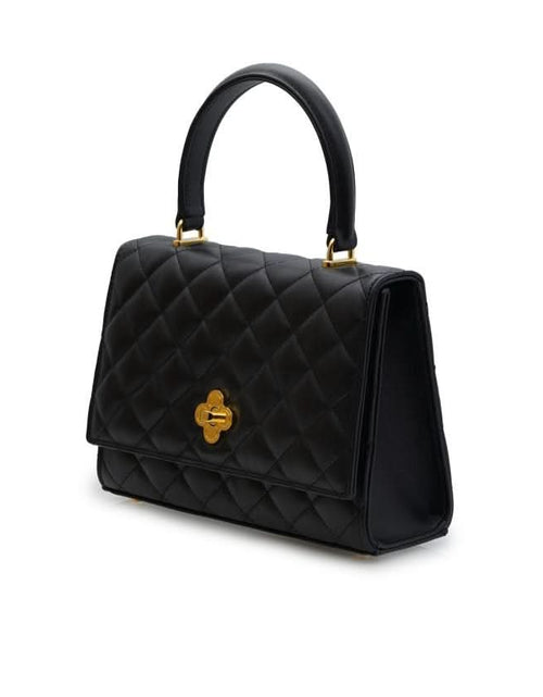 تحميل الصورة إلى عارض المعرض، حقيبة أوبرا الجلدية السوداء المبطنة بسلسلة على شكل زهرة ملتوية
