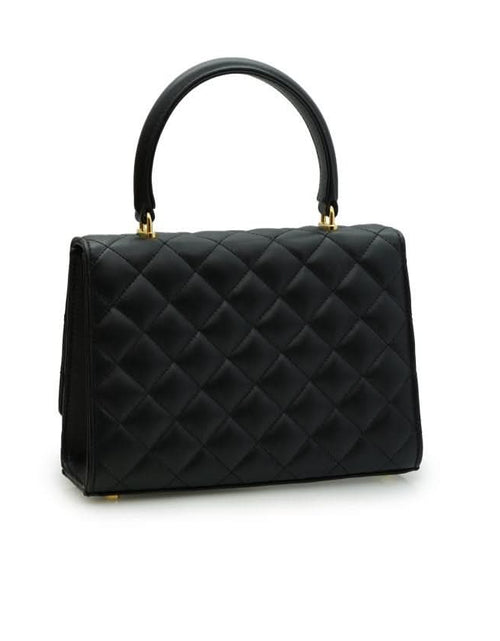 تحميل الصورة إلى عارض المعرض، حقيبة أوبرا الجلدية السوداء المبطنة بسلسلة على شكل زهرة ملتوية
