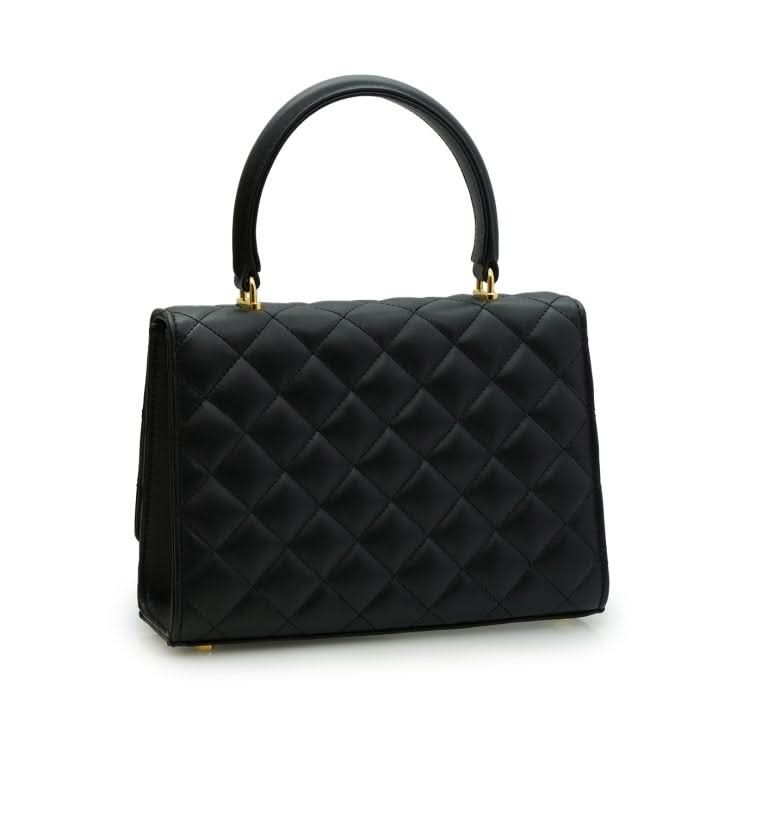 حقيبة أوبرا الجلدية السوداء المبطنة بسلسلة على شكل زهرة ملتوية