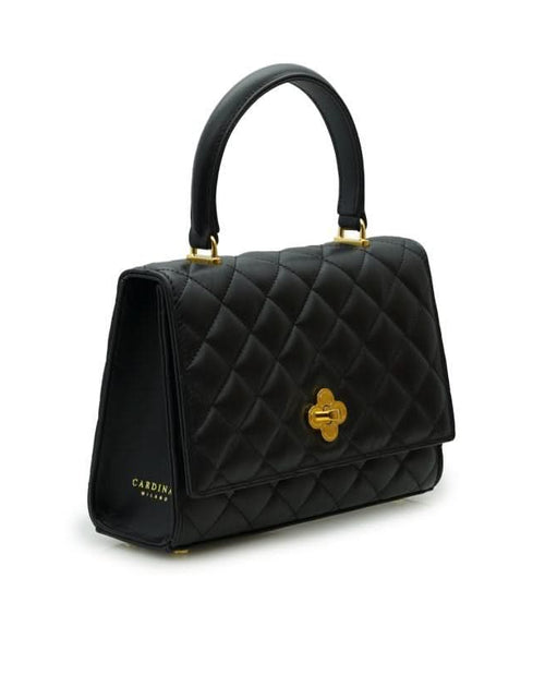 تحميل الصورة إلى عارض المعرض، حقيبة أوبرا الجلدية السوداء المبطنة بسلسلة على شكل زهرة ملتوية
