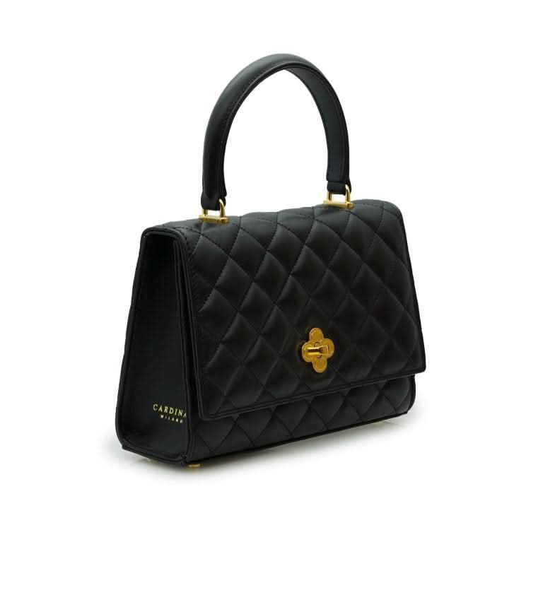 حقيبة أوبرا الجلدية السوداء المبطنة بسلسلة على شكل زهرة ملتوية