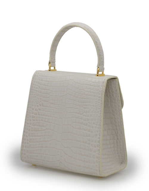 Load image into Gallery viewer, AmrGazzaz عمرو_قزاز LuxuryPerfumes عطور_فاخرة AuthenticPerfume عطور_أصلية NicheFragrance عطور_نيش PerfumeKSA عطور_السعودية ShopOnlineKSA تسوق_أونلاين LuxuryShopping متجر_عطور
